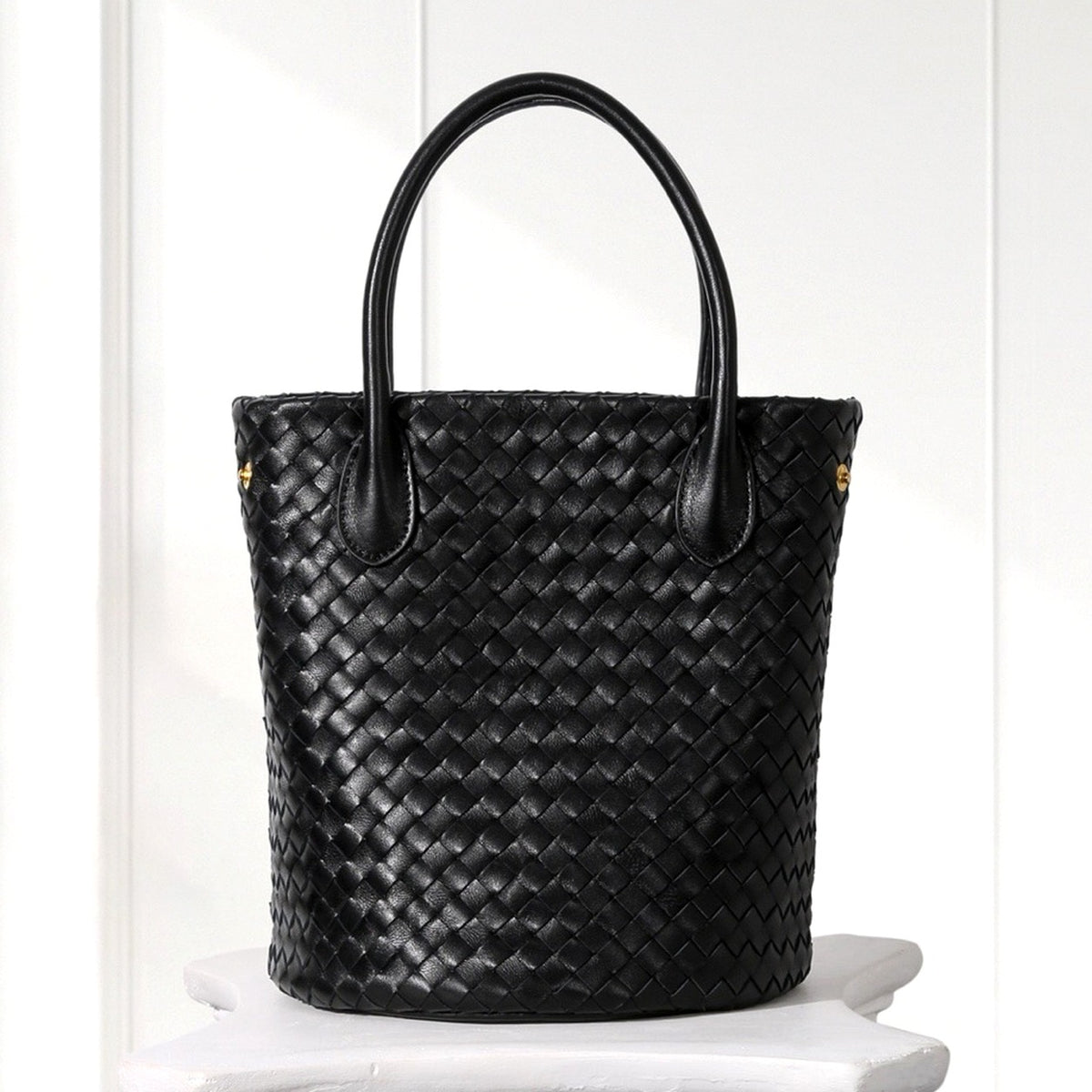 Ingrid Woven Bucket Bag in Black, front view