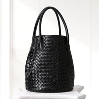 Ingrid Woven Bucket Bag in Black, angled view