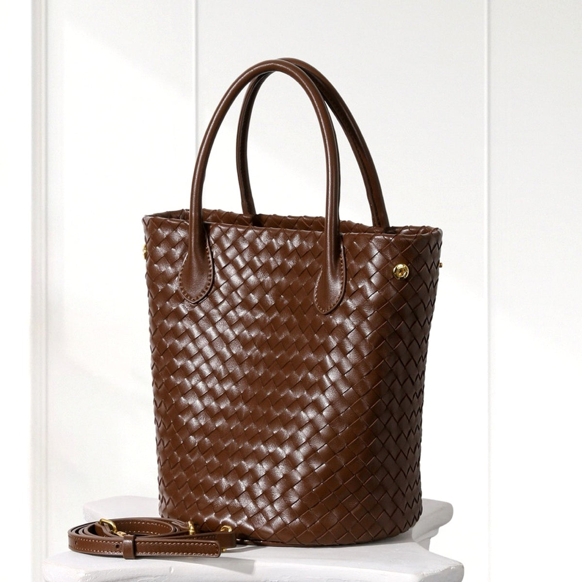 Ingrid Woven Bucket Bag in Brown, angled view