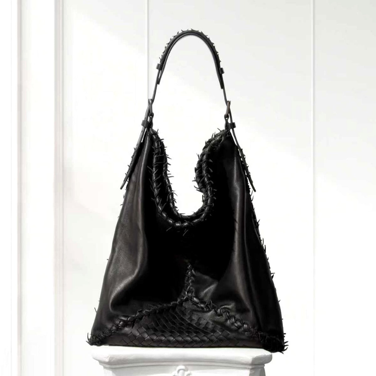 Eira Woven Hobo Bag in Black, front view