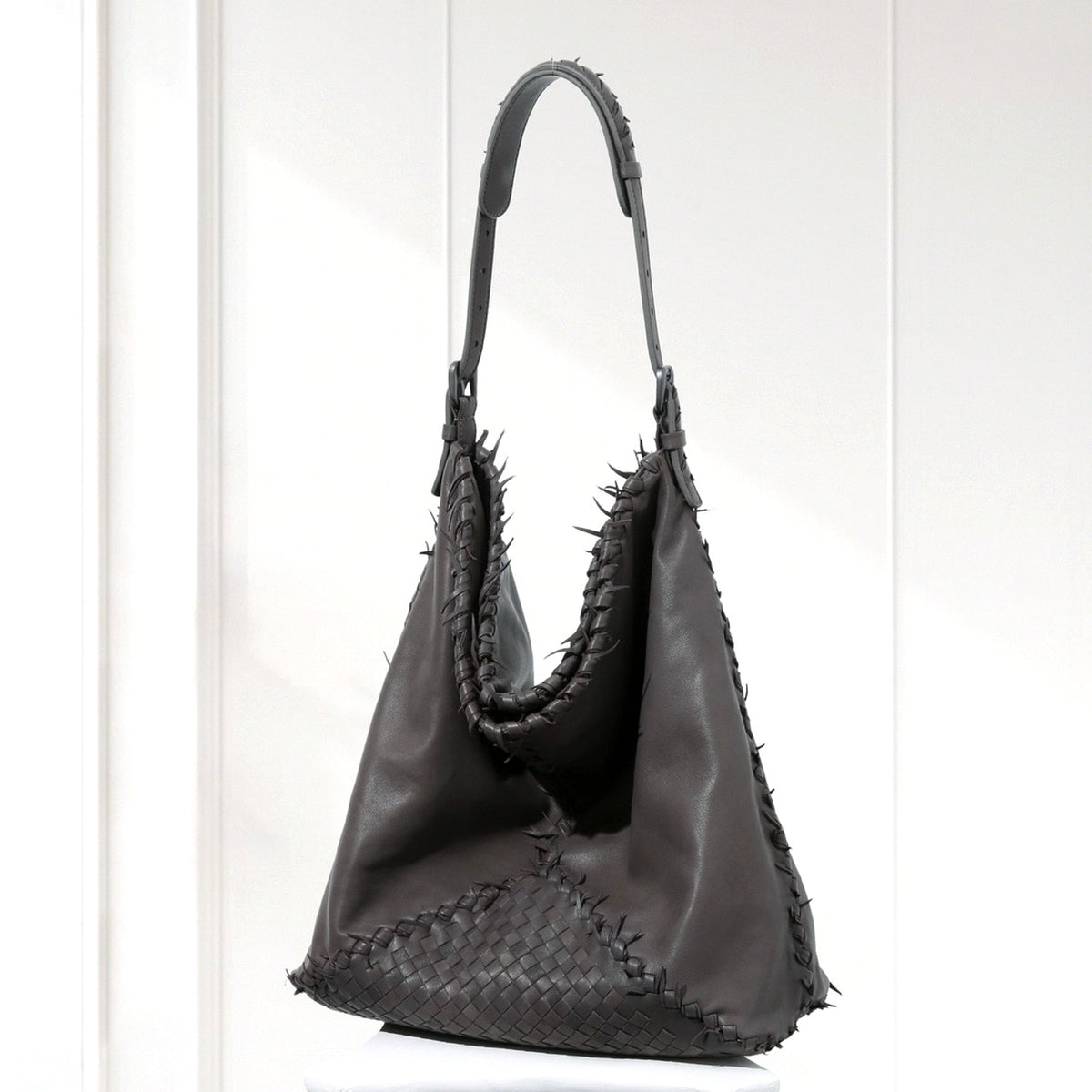 Eira Woven Hobo Bag in Dark Gray, angled view
