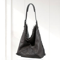Eira Woven Hobo Bag in Dark Gray, angled view