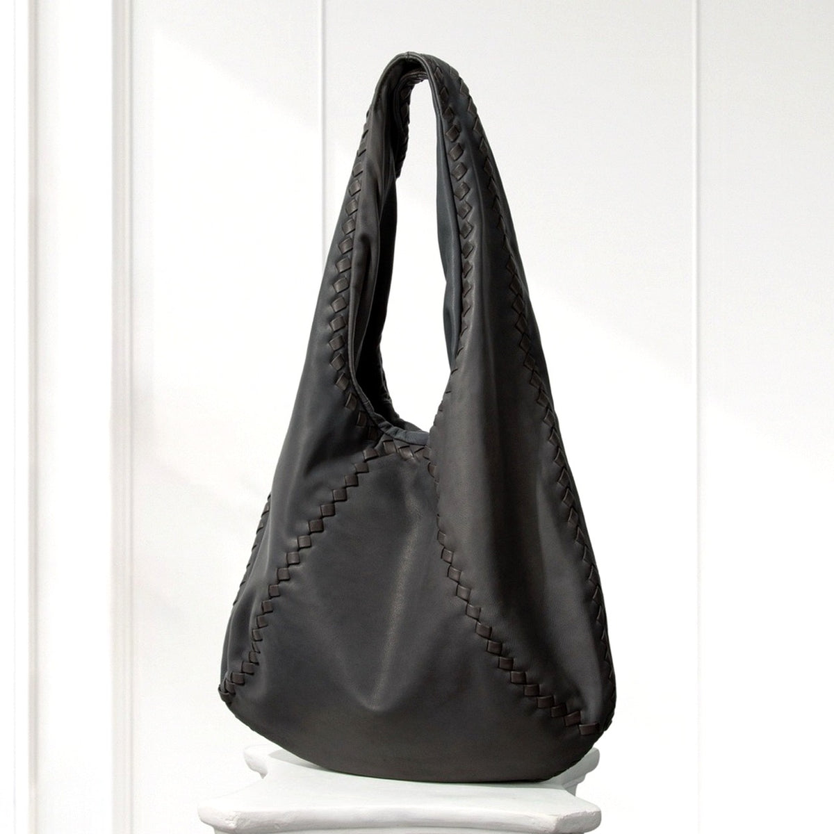 Kaja Hobo Bag in Dark Gray, angled view