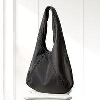 Kaja Hobo Bag in Dark Gray, angled view