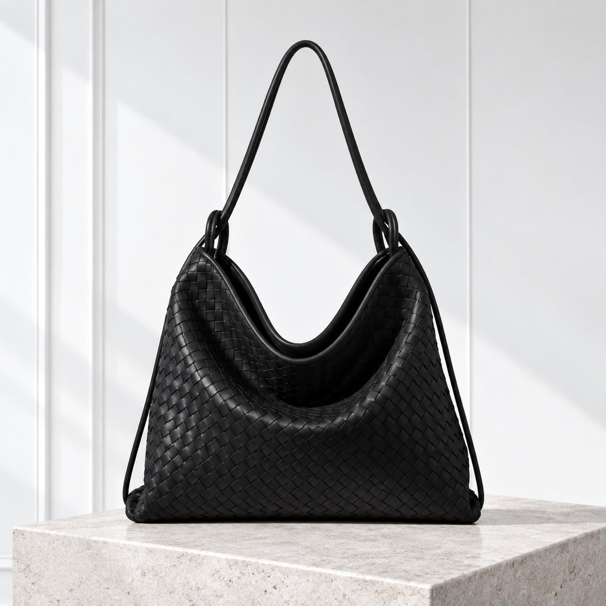 Runa Woven Hobo Bag in Black, front view