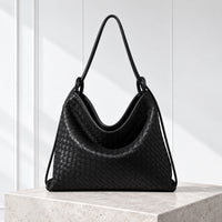 Runa Woven Hobo Bag in Black, front view