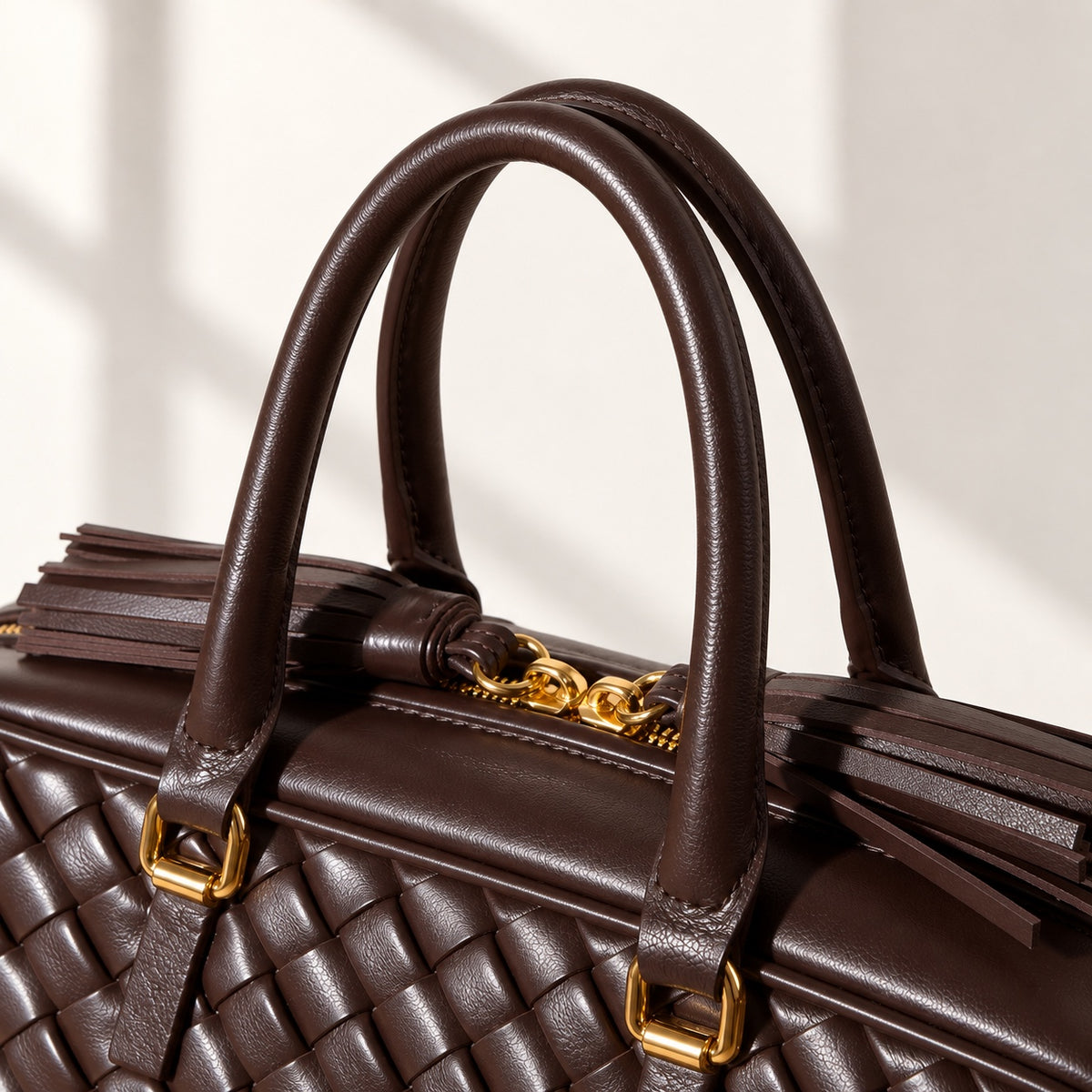 Greta Boston Bag in Dark Brown, handle and hardware detail