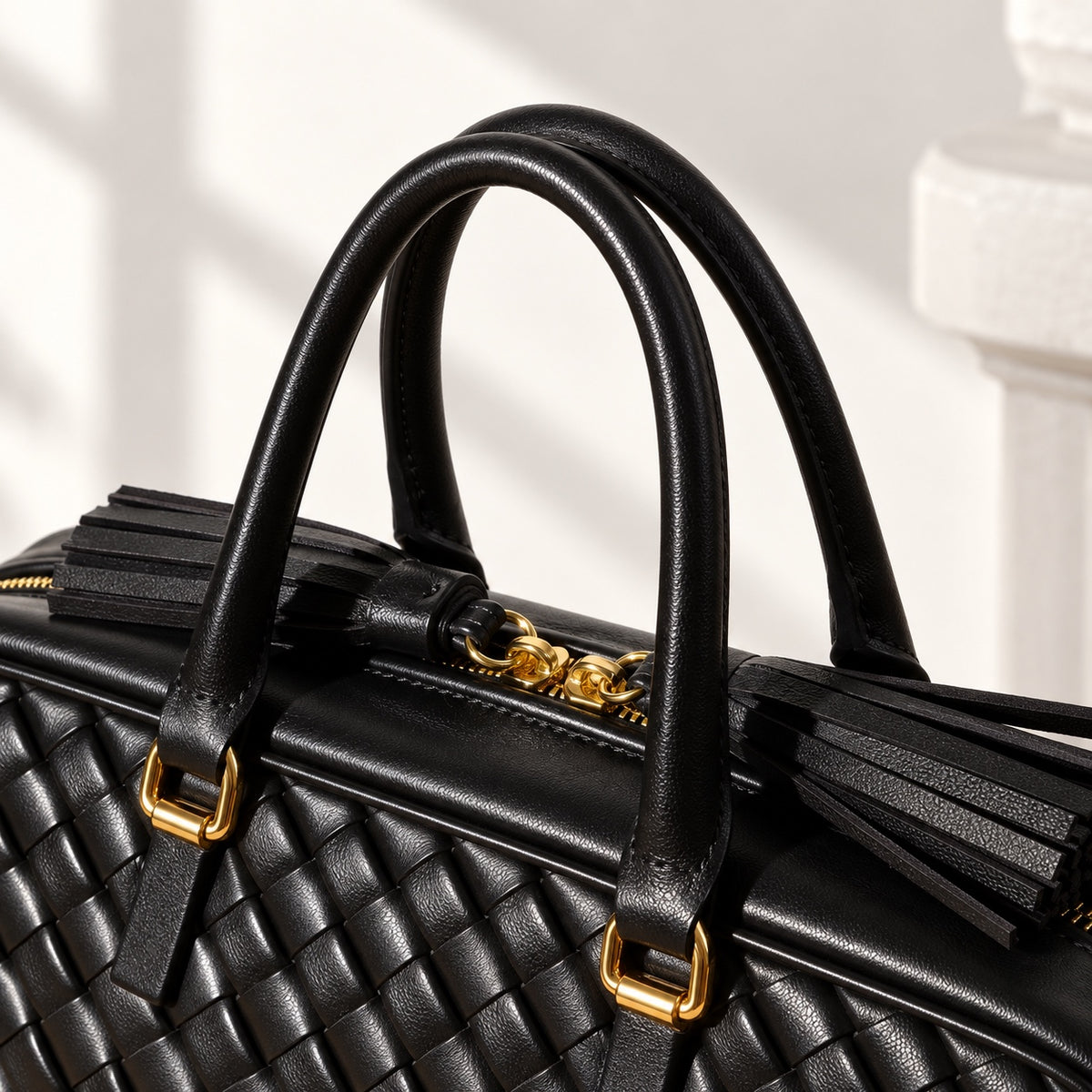 Greta Boston Bag in Black, handle and hardware detail