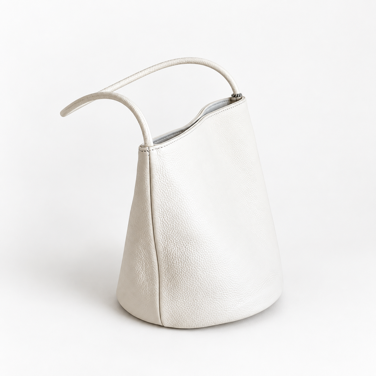 Cleo Smooth Bucket Bag in Ivory, side view