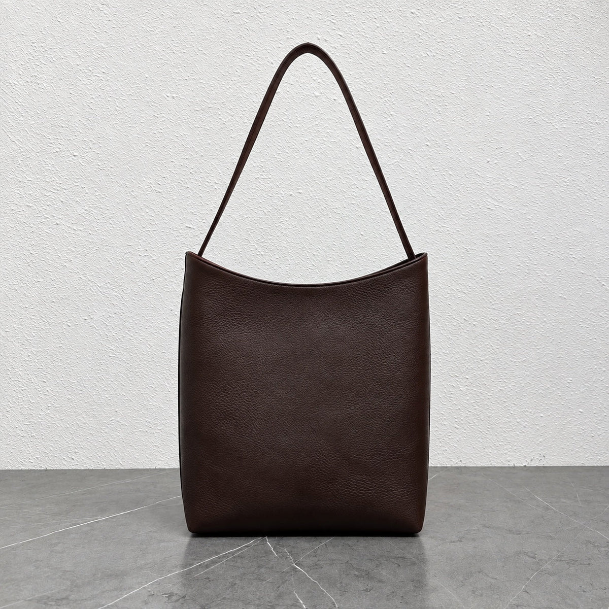 Arc Shoulder Bag in Dark Brown, front view