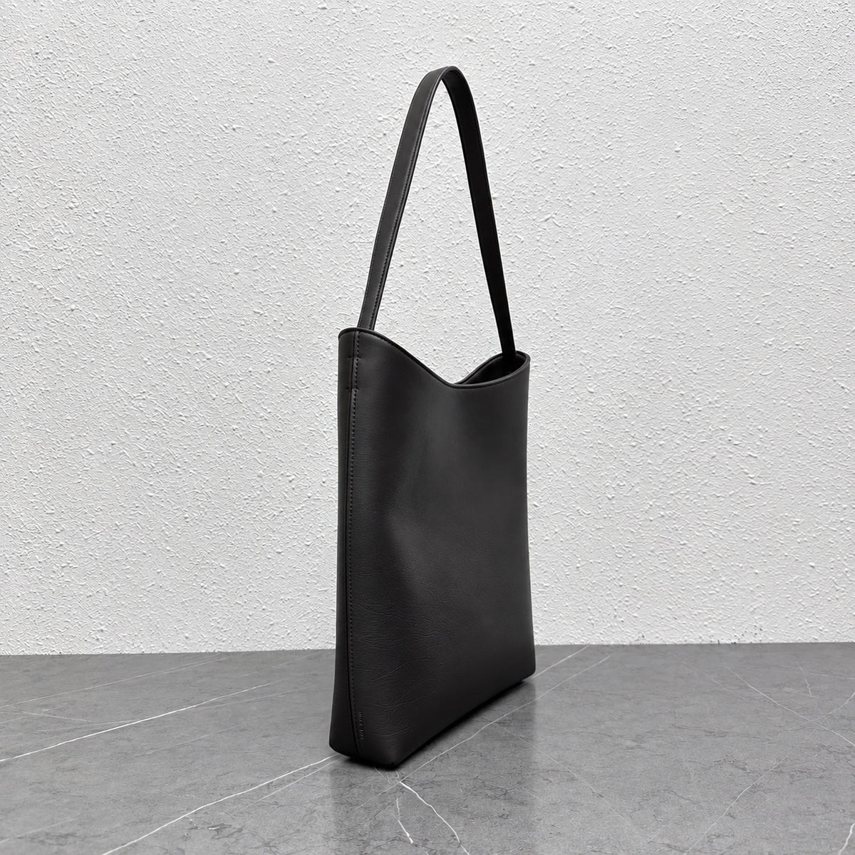 Arc Shoulder Bag in Black, side view