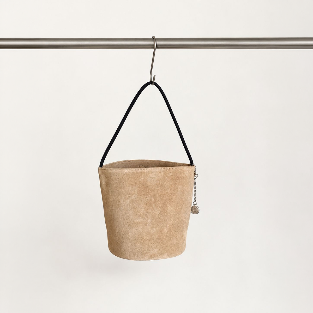 Camel Cleo Suede Bucket Bag, hanging front view
