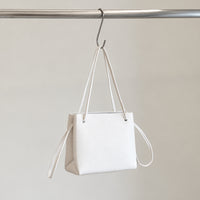 Mila Shoulder Bag in Ivory, angled view