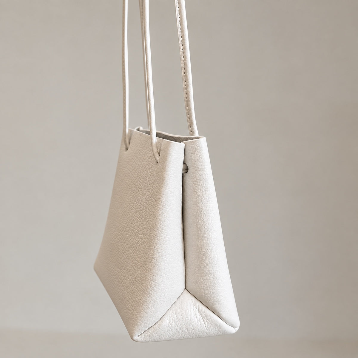 Mila Shoulder Bag in Ivory, side gusset detail