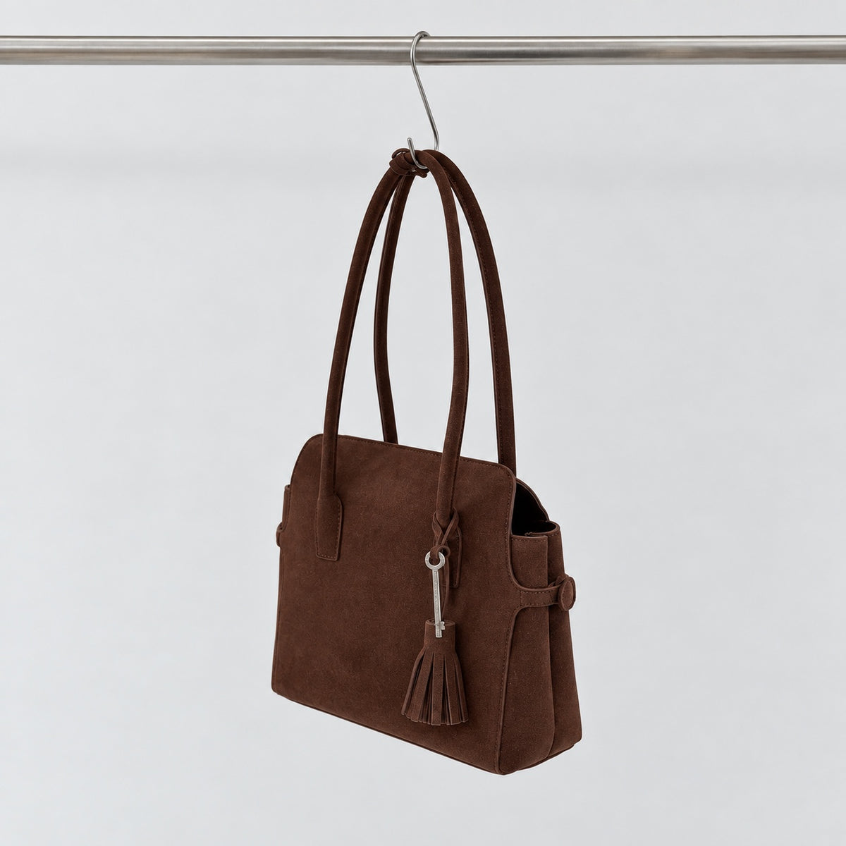Freya Tassel Shoulder Bag in Brown, suede angled view