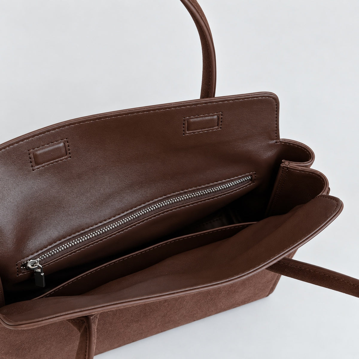 Freya Tassel Shoulder Bag in Brown, interior zip pocket detail