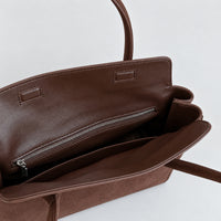 Freya Tassel Shoulder Bag in Brown, interior zip pocket detail