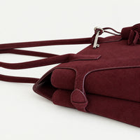 Freya Tassel Shoulder Bag in Deep Brown, side and suede detail