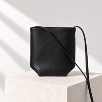 Asta Mini Bucket Bag in Black, front view