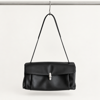 Elsa Pleated Shoulder Bag in Black, front hanging view