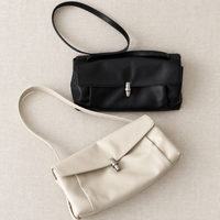 Elsa Pleated Shoulder Bag in Black and Ivory, flat lay
