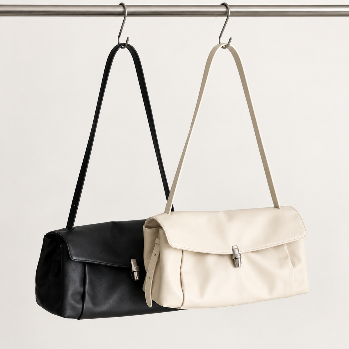 Elsa Pleated Shoulder Bag in Black and Ivory, hanging together