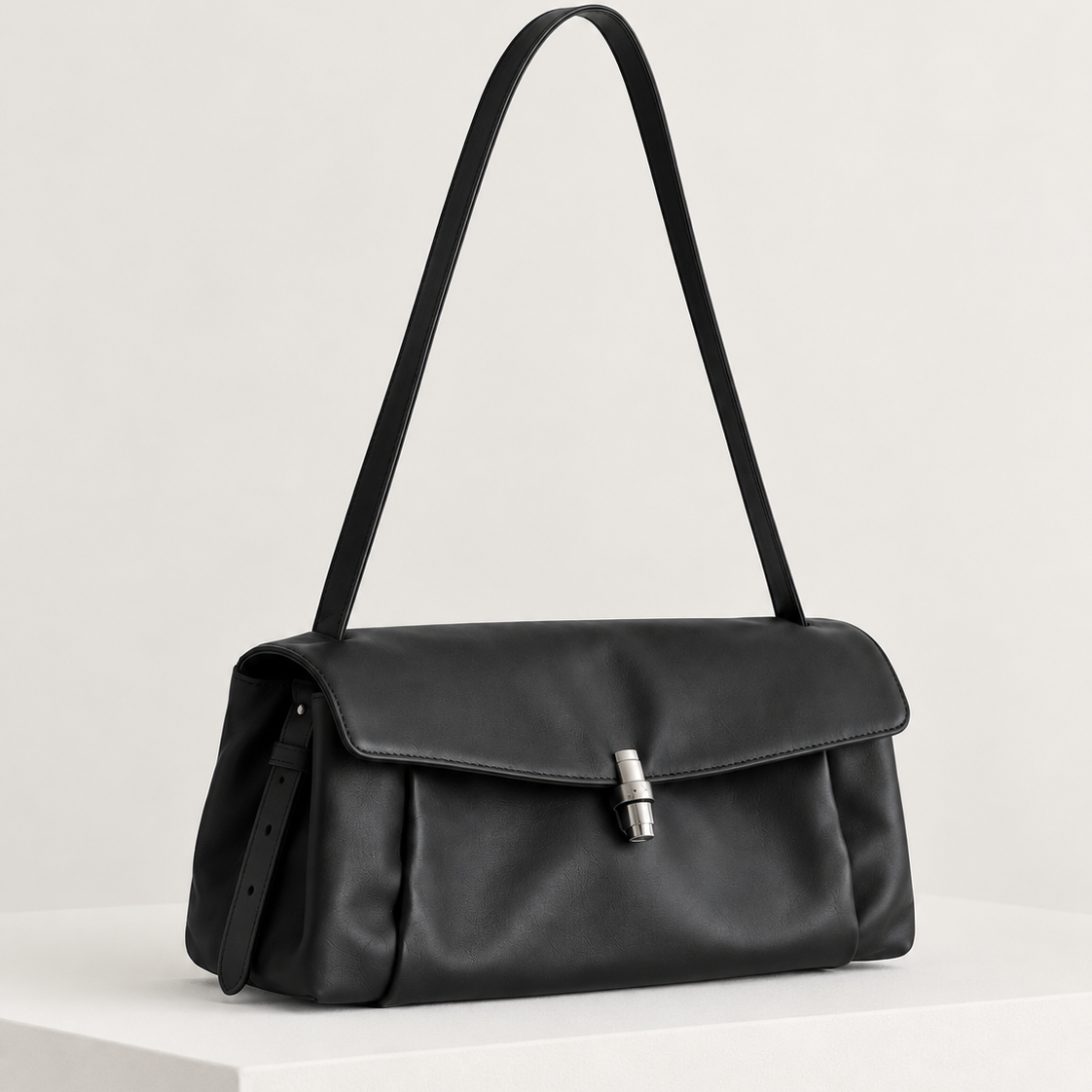 Elsa Pleated Shoulder Bag in Black, on pedestal