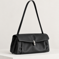 Elsa Pleated Shoulder Bag in Black, on pedestal