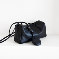Esme Smooth Shoulder Bag in Black smooth cowhide, angled view