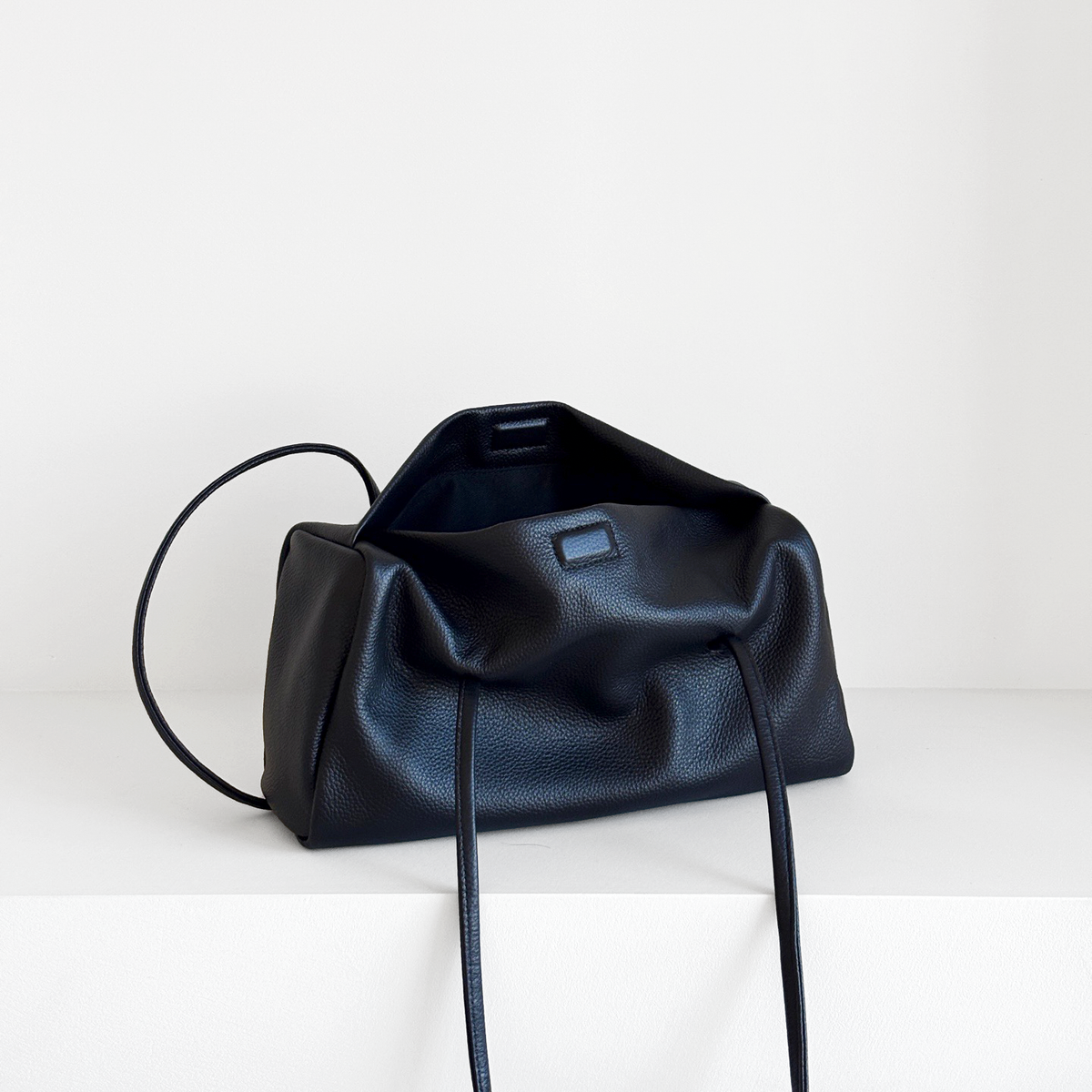 Esme Smooth Shoulder Bag in Black smooth cowhide, open interior view