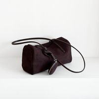 Esme Matte Shoulder Bag in Deep Plum matte cowhide, angled view