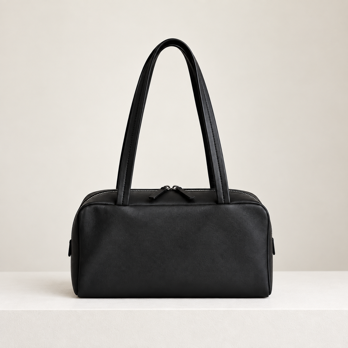 Nina Mini Bowling Bag in Black, front studio view