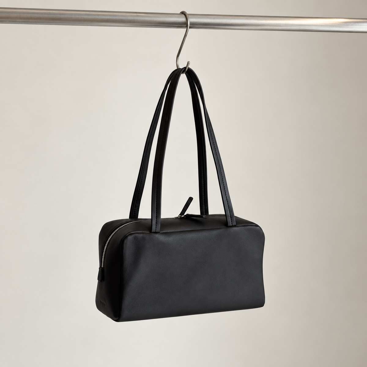Nina Mini Bowling Bag in Black, hanging view