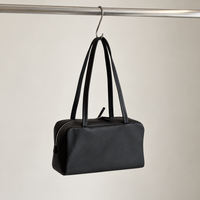 Nina Mini Bowling Bag in Black, hanging view