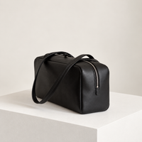 Nina Mini Bowling Bag in Black, side three-quarter view