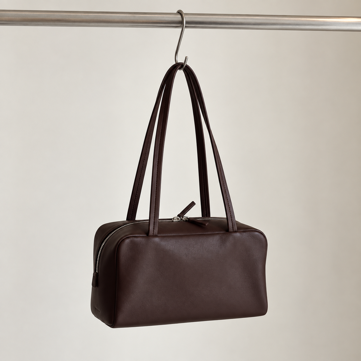 Nina Mini Bowling Bag in Dark Brown, hanging view