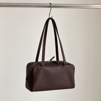 Nina Mini Bowling Bag in Dark Brown, hanging view