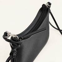 Noa Curve Shoulder Bag in Black, top opening and hardware detail