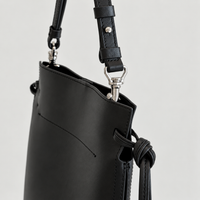 Tilda Tie Shoulder Bag in Black, side tie and silver-tone hardware detail