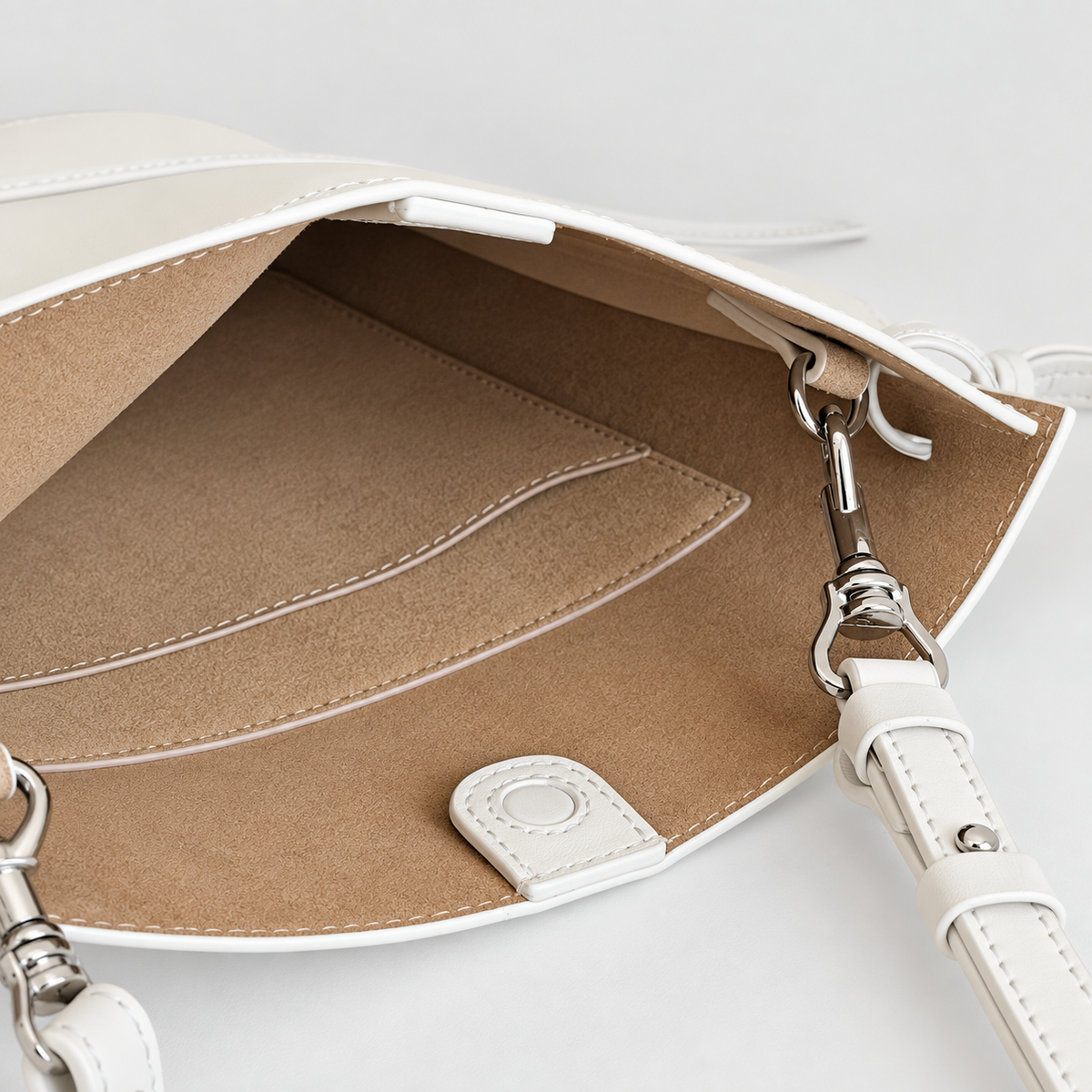 Tilda Tie Shoulder Bag in Ivory, interior and magnetic closure detail