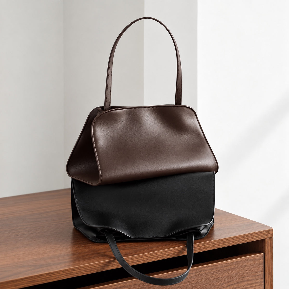 Odette Sculptural Shoulder Bag in Dark Brown and Black, stacked styling view