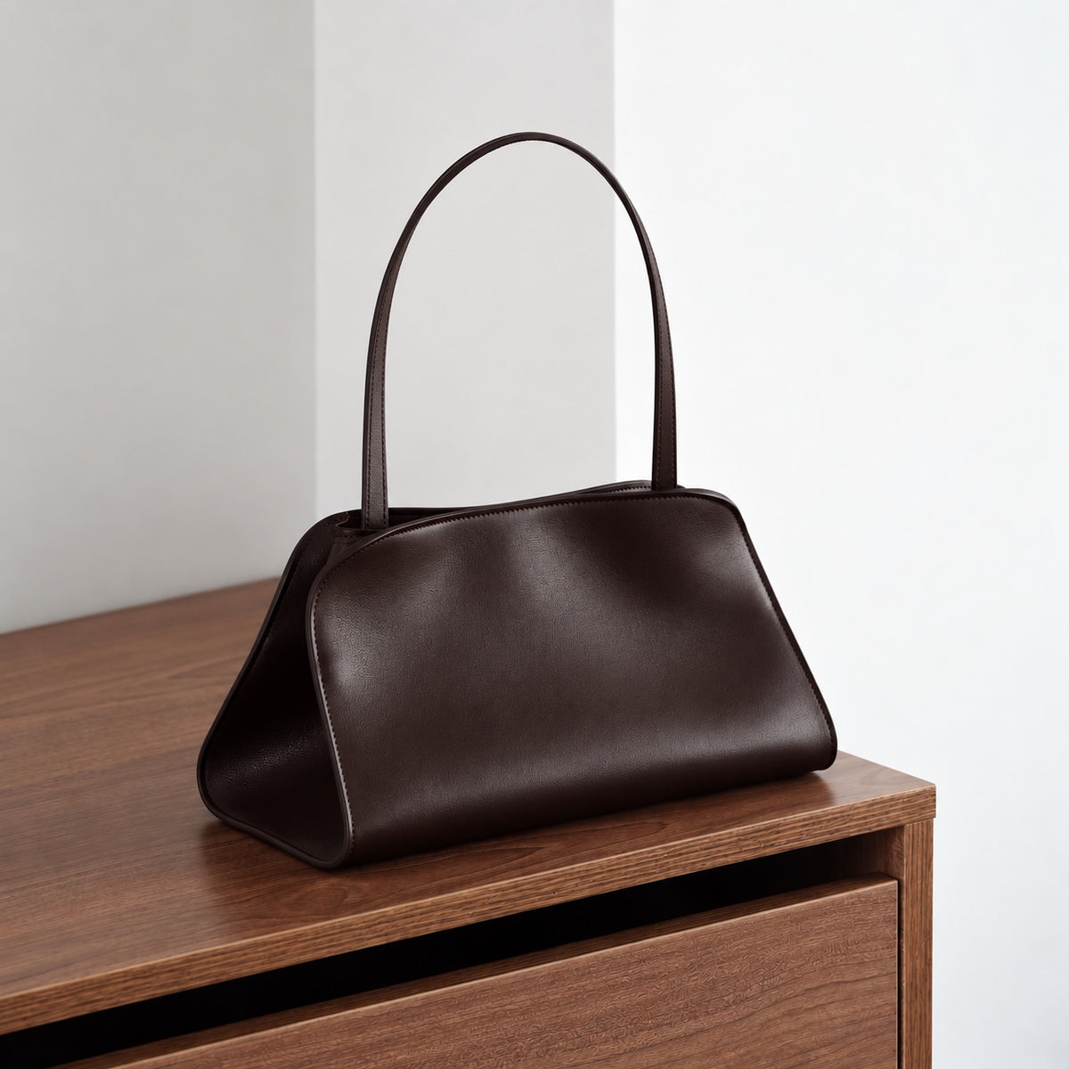 Odette Sculptural Shoulder Bag in Dark Brown, front three-quarter view